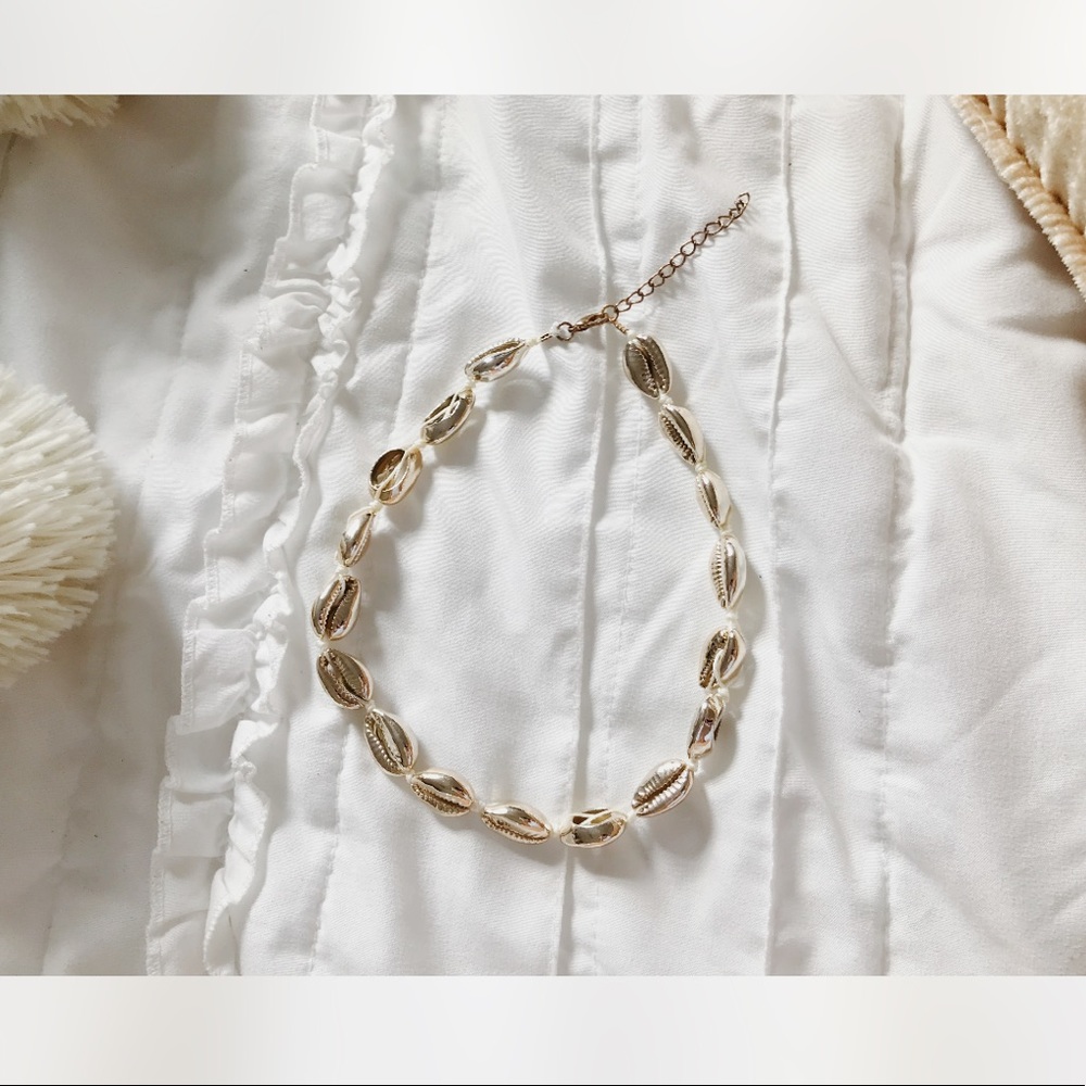 Gold puka shell necklace